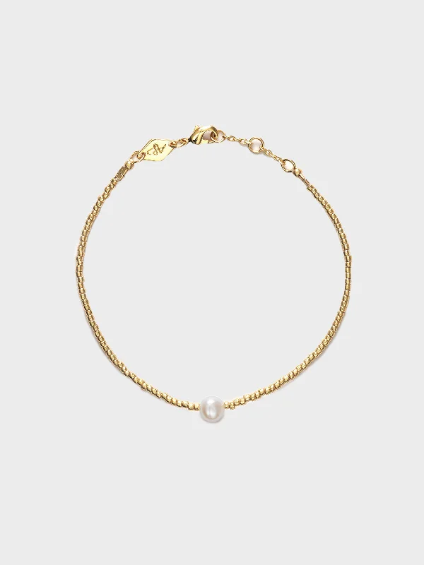 Large Statement Bracelets-Pearly Bracelet in Brass with Gold Finish